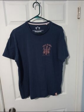 Free Planet Navy Tee with Pink Surfboard Graphic